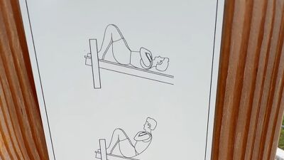 Skilt som viser treningøvelse.