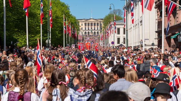 The 17th of May parade on Karl Johans Gate toward the Royal Palace.