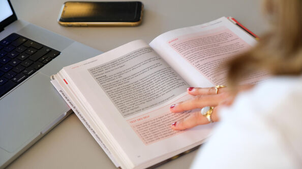 open textbook with Norwegian